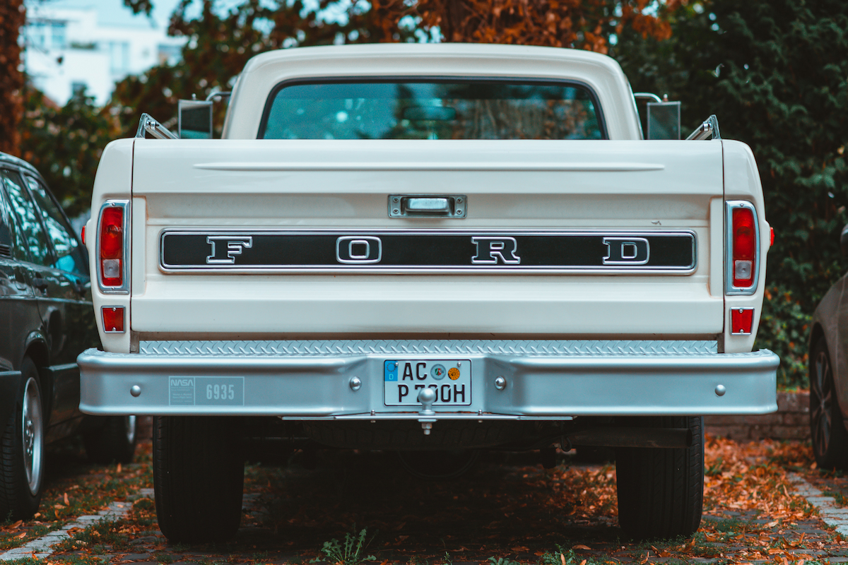 Close-up photo of the back of a Ford pickup truck.