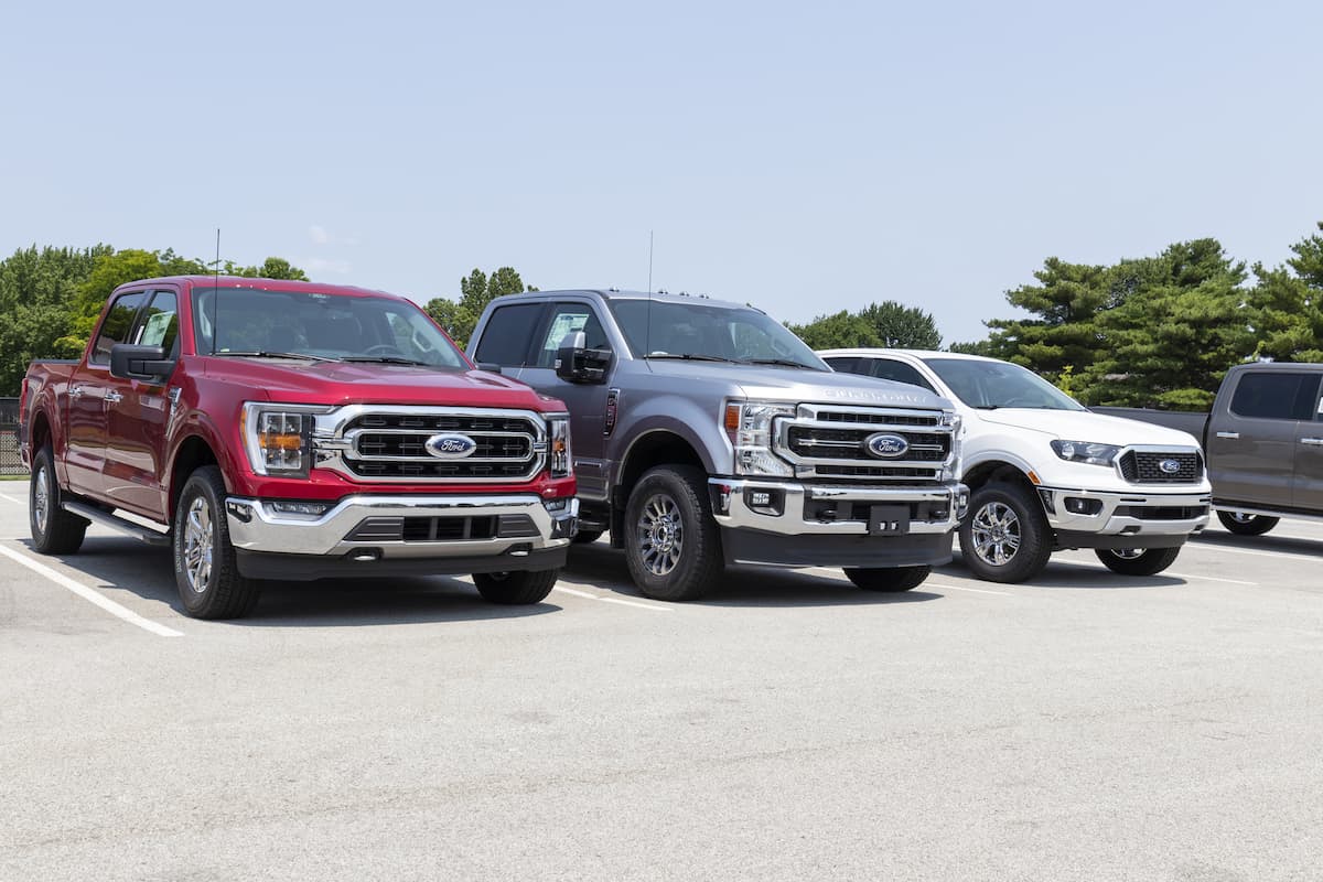 Ford F-150, F-250 and all new Ranger on display at a dealership.