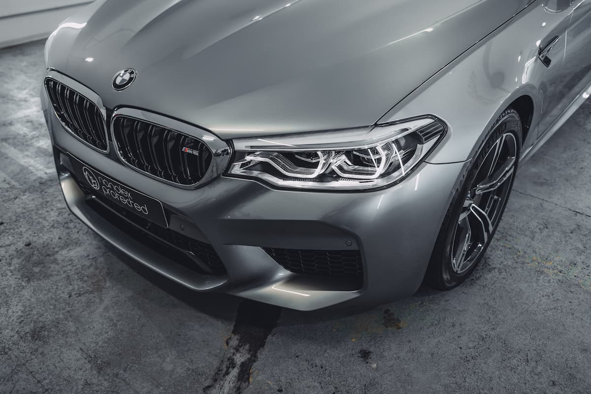 Photo of the front bumper of a BMW. 