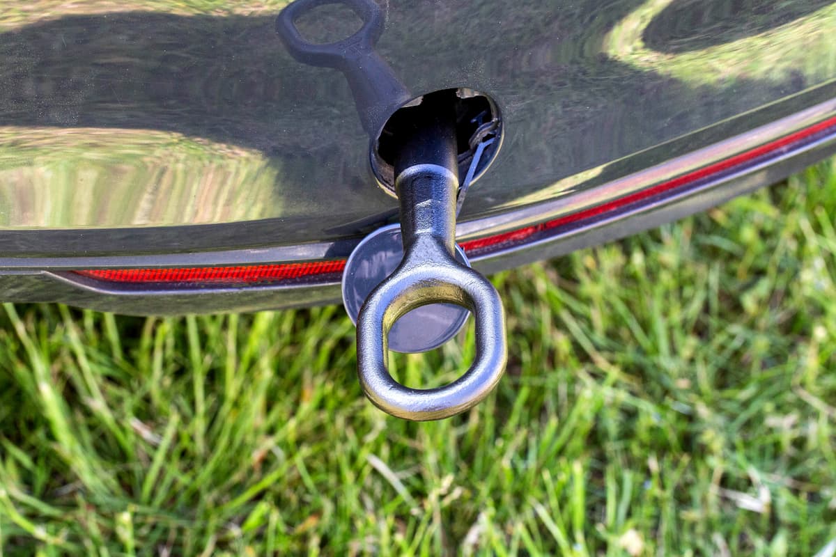 Close-up photo of a tow eye attached to a car. 